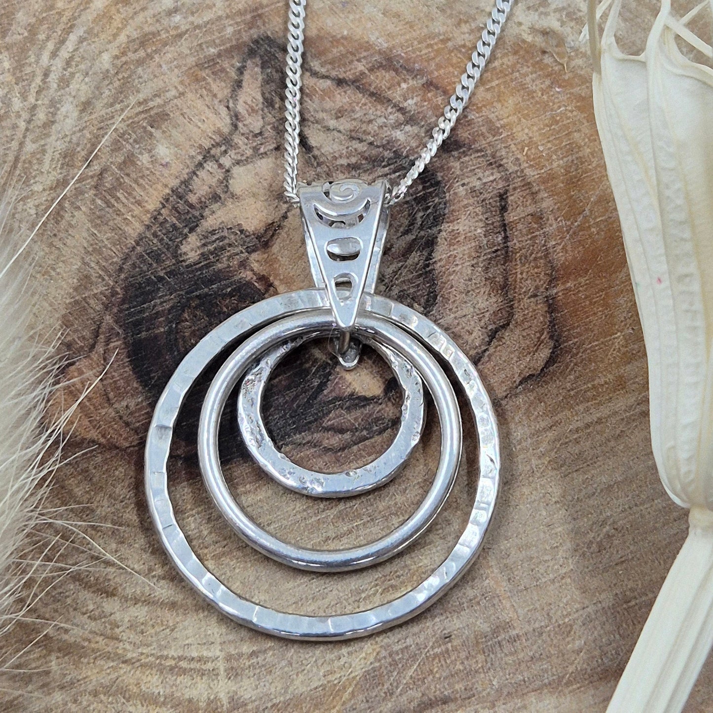 Handmade Sterling Silver Pendant Necklace: Textured Rings Charm Jones Stones