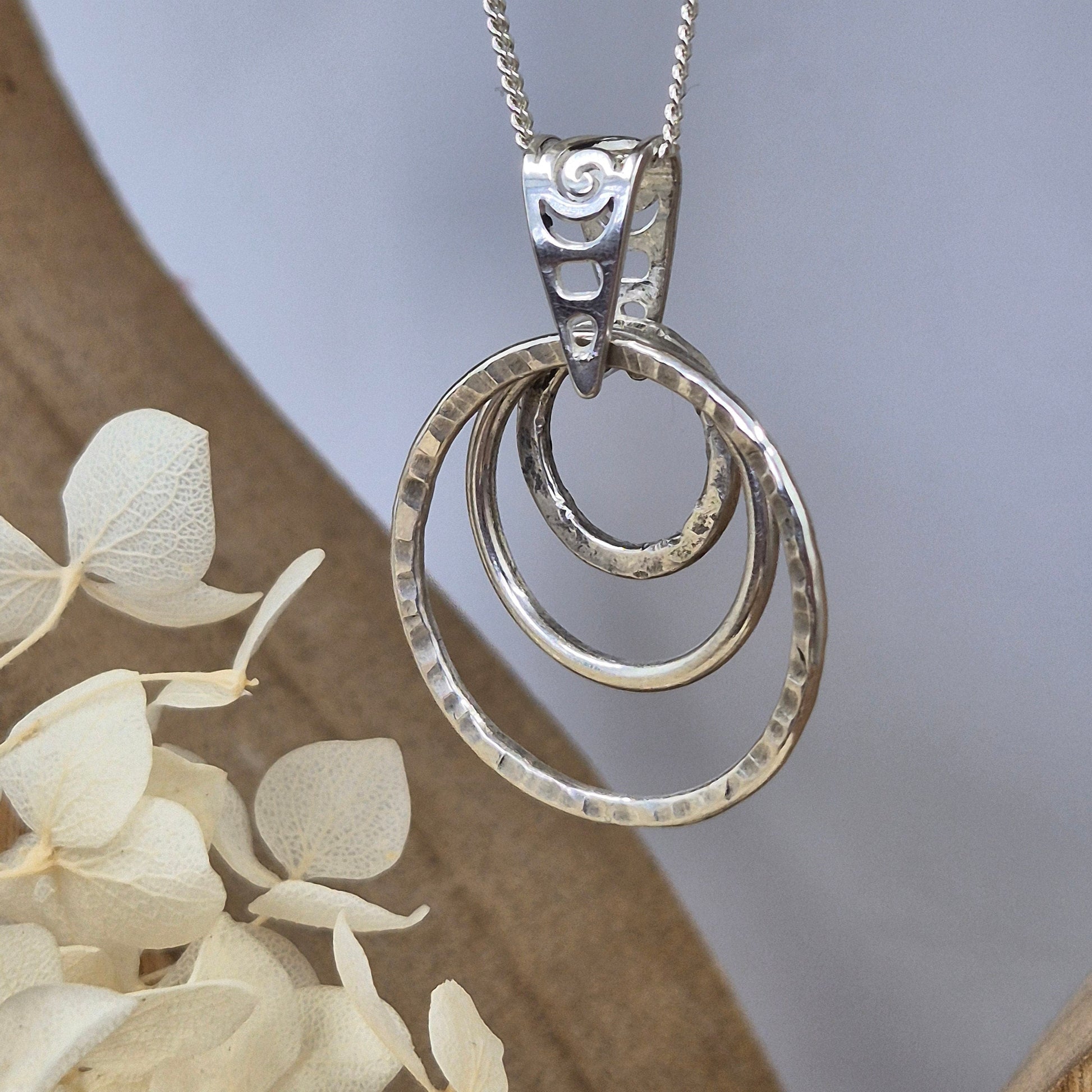 Handmade Sterling Silver Pendant Necklace: Textured Rings Charm Jones Stones