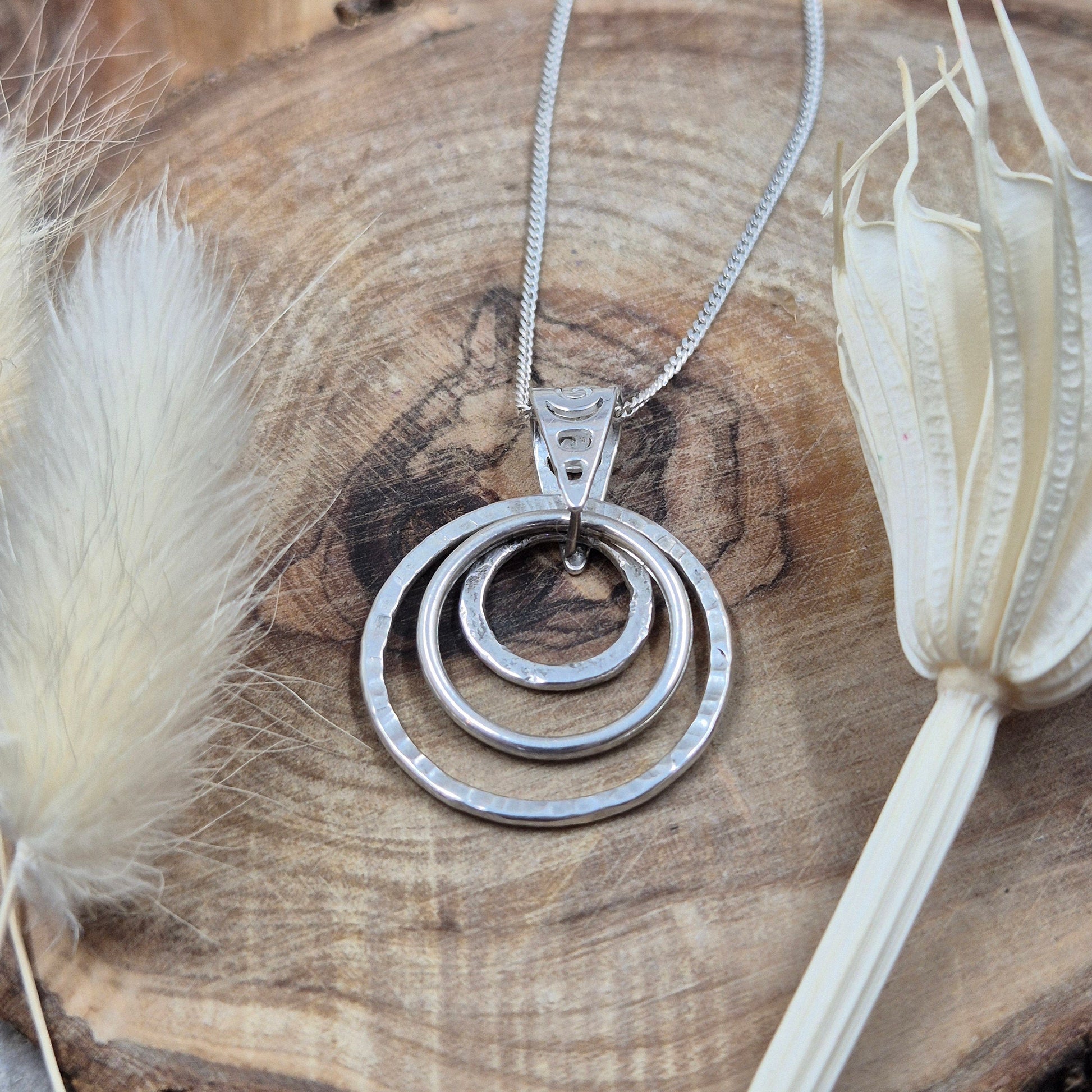 Handmade Sterling Silver Pendant Necklace: Textured Rings Charm Jones Stones