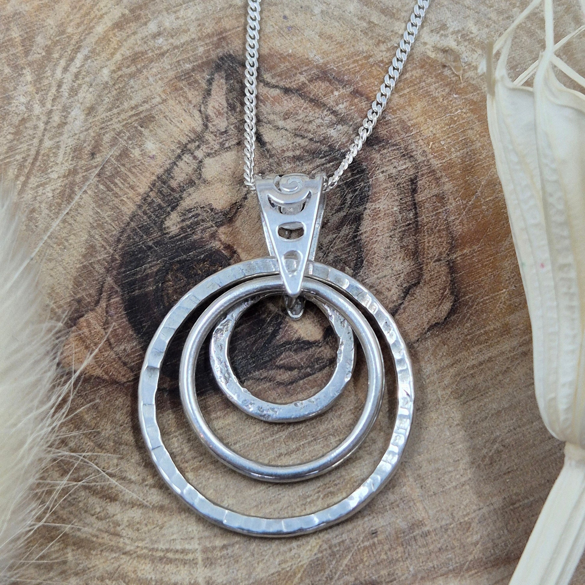 Handmade Sterling Silver Pendant Necklace: Textured Rings Charm Jones Stones
