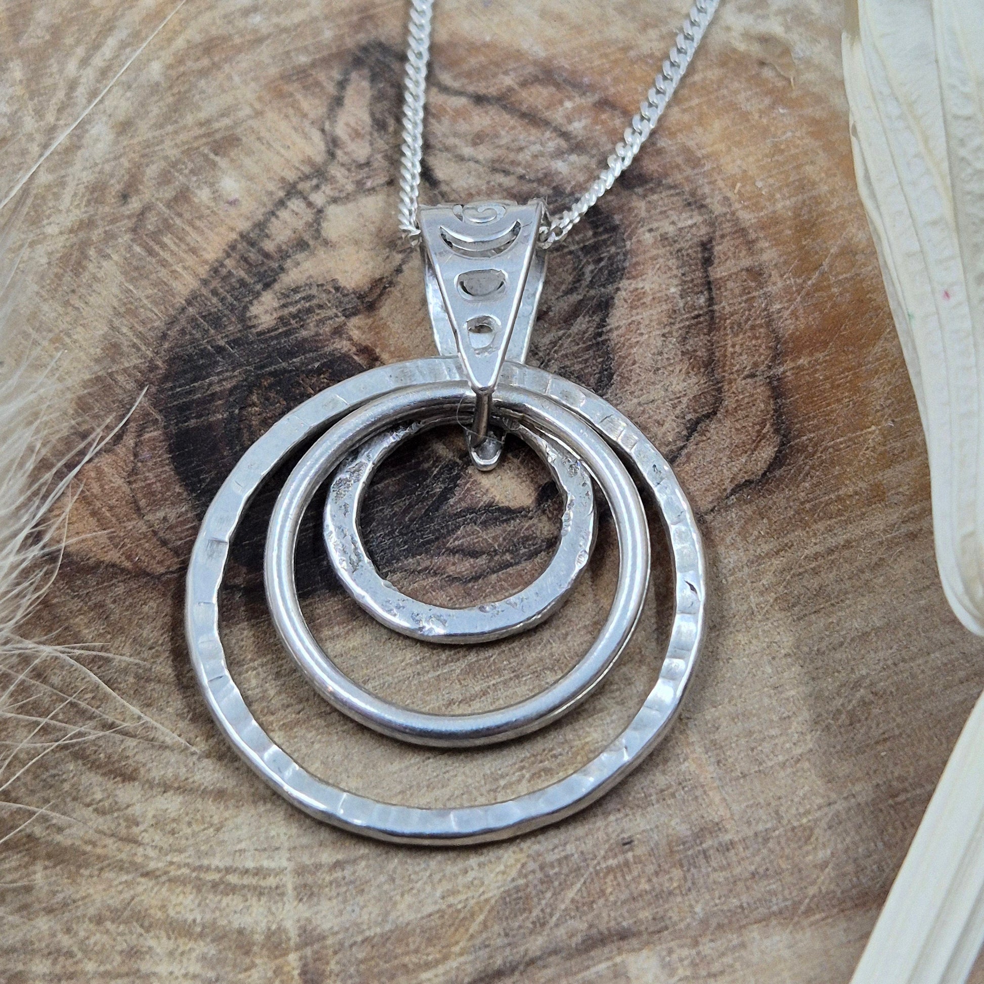 Handmade Sterling Silver Pendant Necklace: Textured Rings Charm Jones Stones