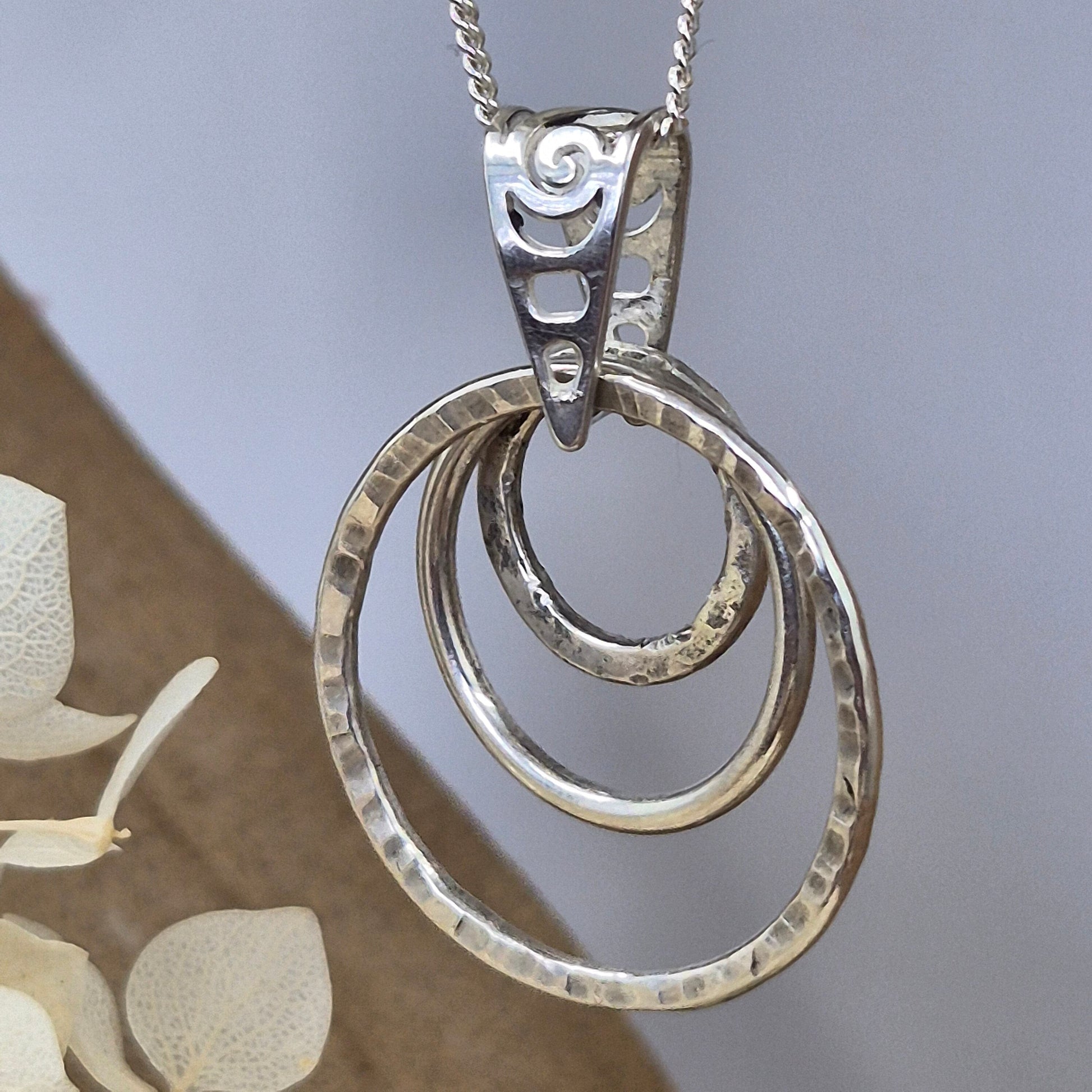 Handmade Sterling Silver Pendant Necklace: Textured Rings Charm Jones Stones