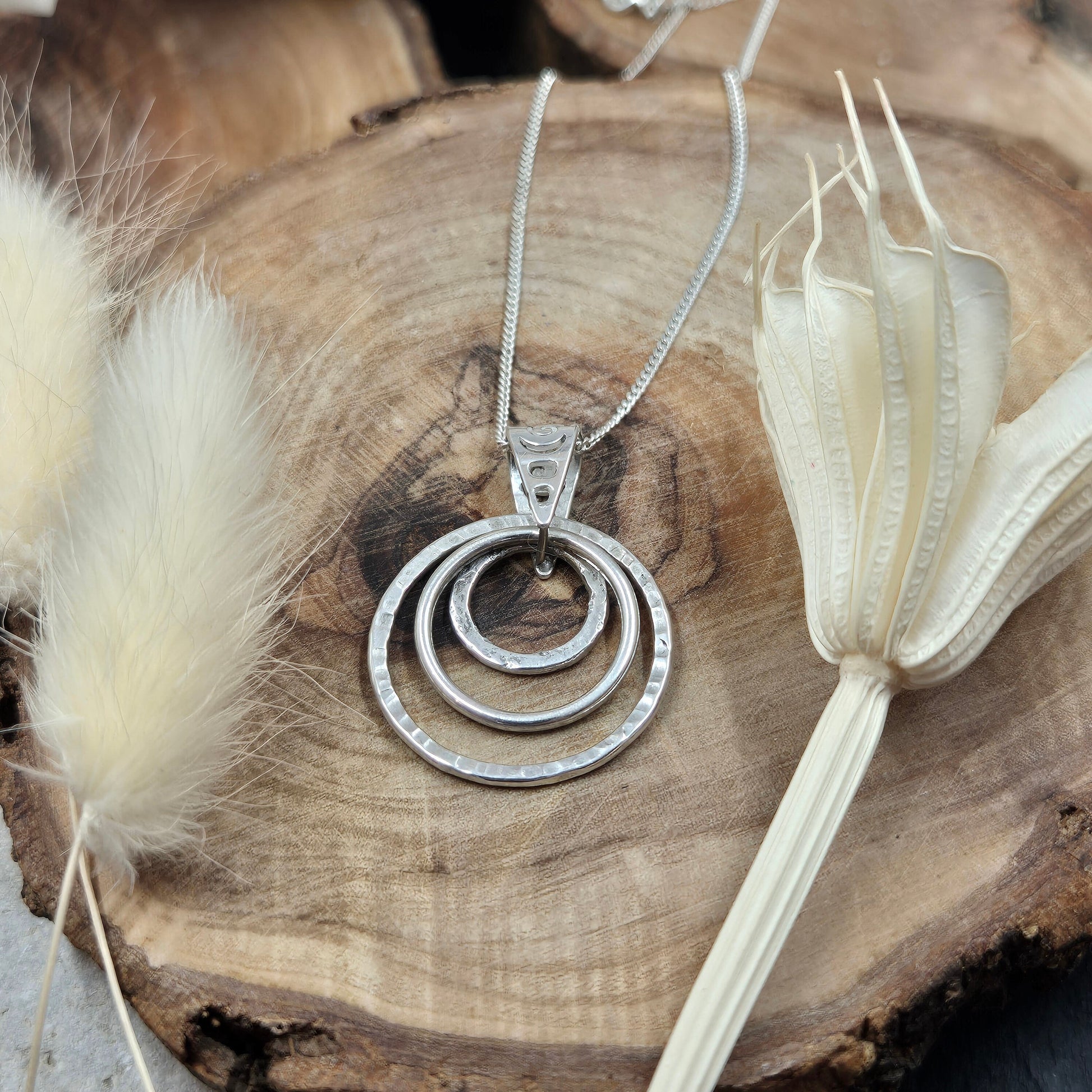 Handmade Sterling Silver Pendant Necklace: Textured Rings Charm Jones Stones