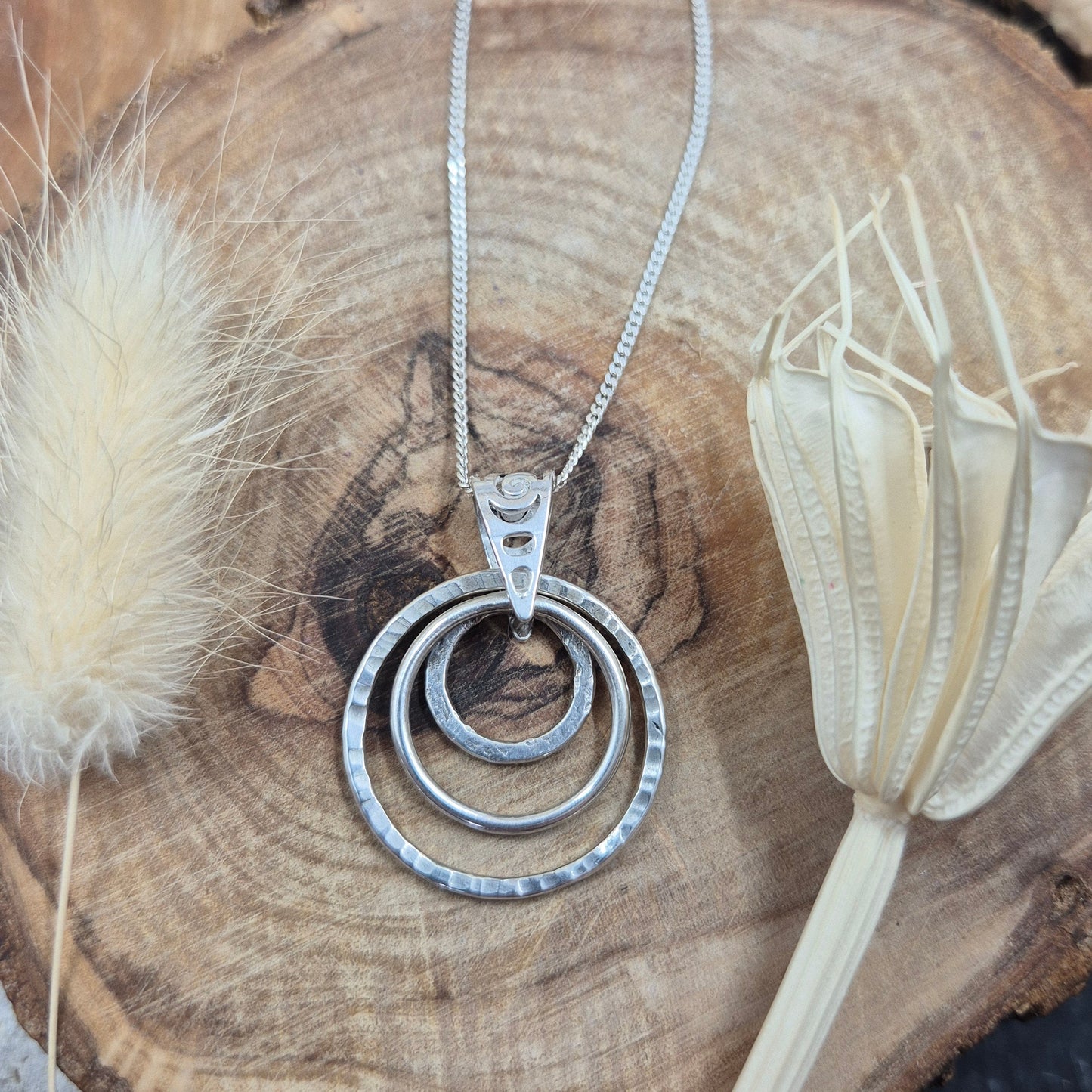 Handmade Sterling Silver Pendant Necklace: Textured Rings Charm Jones Stones