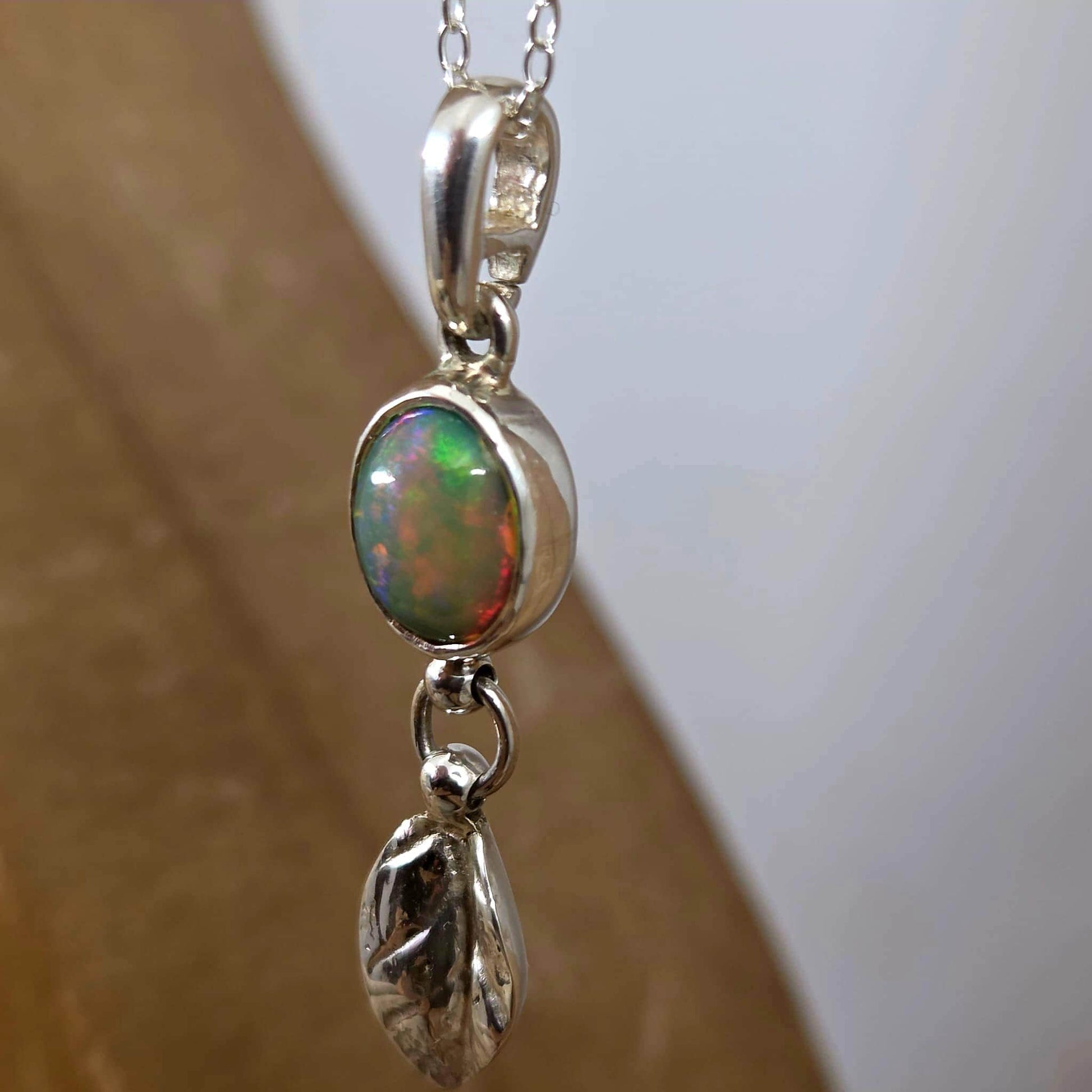 Welo Opal Silver Leaf Pendant: Sterling Silver Ethiopian Crystal Jones Stones