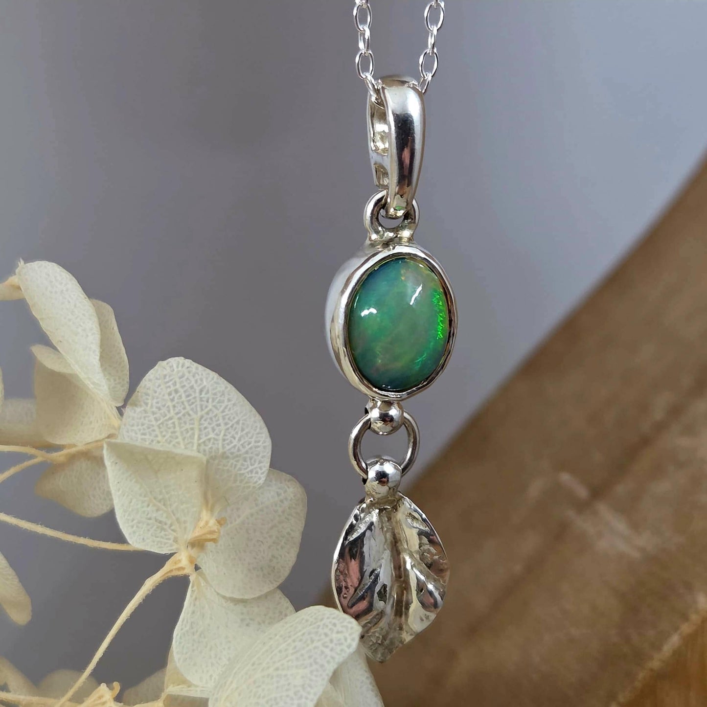 Welo Opal Silver Leaf Pendant: Sterling Silver Ethiopian Crystal Jones Stones